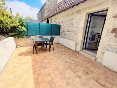 Balcon ou terrasse dans l'établissement Maison 30m2 - 1 chambre - Jardin