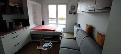 Cuisine ou kitchenette dans l'établissement Au P'tit Littoral