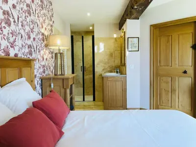 Un ou plusieurs lits dans un hébergement de l'établissement Maison chic proche du Mont Saint Michel