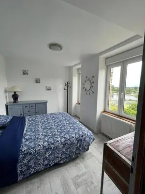 Un ou plusieurs lits dans un hébergement de l'établissement La maison du lac