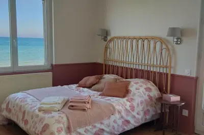 Un ou plusieurs lits dans un hébergement de l'établissement Vue exceptionnelle en front de mer, 8 personnes