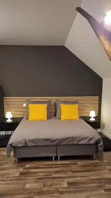 Un ou plusieurs lits dans un hébergement de l'établissement La Petite Taupe - Chambres d'hôtes