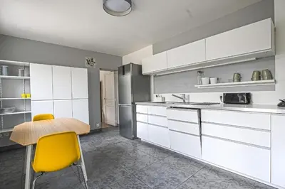 Cuisine ou kitchenette dans l'établissement La Potinière - Maison familiale
