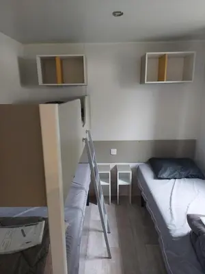 Un ou plusieurs lits dans un hébergement de l'établissement Mobil home Ouistreham