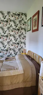 Un ou plusieurs lits dans un hébergement de l'établissement 1 chambre 2 personnes dans une maison avec jardin proche centres d'intérêt et commerces
