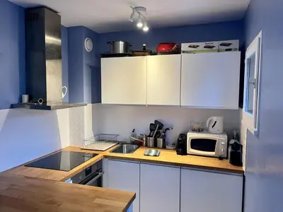 Cuisine ou kitchenette dans l'établissement Appartement charmant bord de mer
