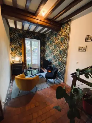 Coin salon dans l'établissement Chambre hôtes