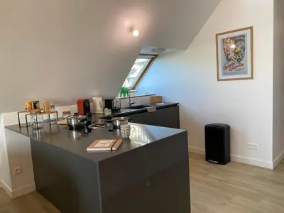 Cuisine ou kitchenette dans l'établissement Alizée