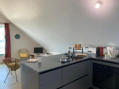 Cuisine ou kitchenette dans l'établissement Alizée