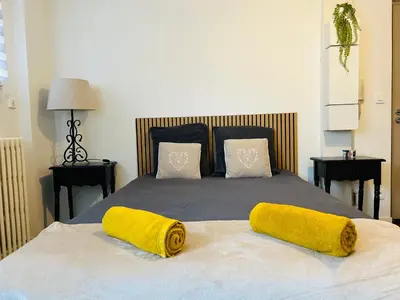 Un ou plusieurs lits dans un hébergement de l'établissement Le 2 - Grand studio Caen Centre Port de plaisance