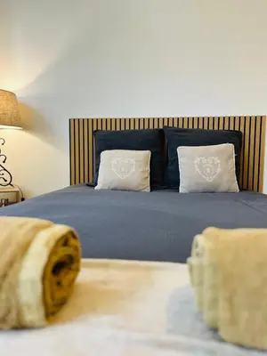 Un ou plusieurs lits dans un hébergement de l'établissement Le 2 - Grand studio Caen Centre Port de plaisance