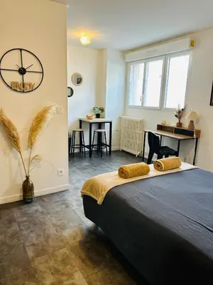 Un ou plusieurs lits dans un hébergement de l'établissement Le 2 - Grand studio Caen Centre Port de plaisance