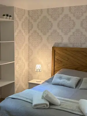 Un ou plusieurs lits dans un hébergement de l'établissement Ambiance cocooning pour visiter la Normandie
