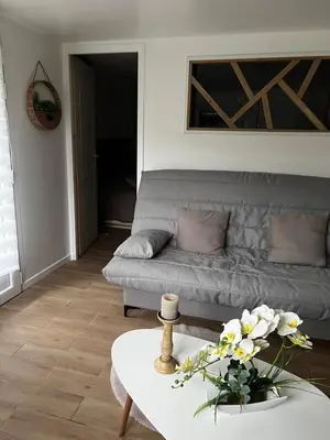 Coin salon dans l'établissement Ambiance cocooning pour visiter la Normandie