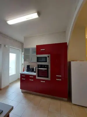 Cuisine ou kitchenette dans l'établissement Granville : appart. vue mer proche centre ville