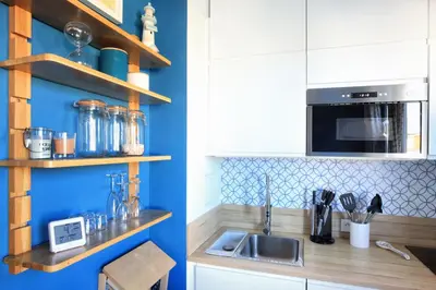 Cuisine ou kitchenette dans l'établissement Terrasse de Chimay - Charmant apt dans résidence front de mer