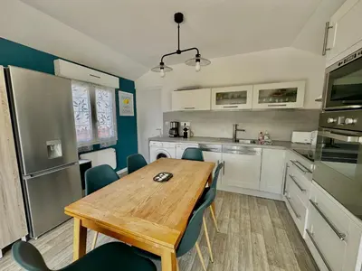 Cuisine ou kitchenette dans l'établissement Captain's Quarters - Maison en bord de plage