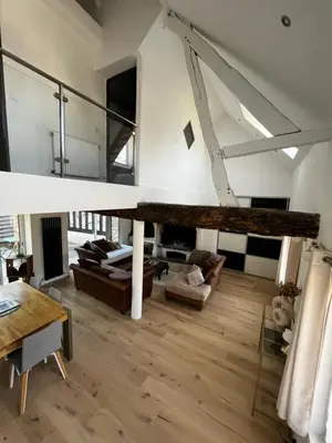Coin salon dans l'établissement Maison avec cheminée ancienne - Proche Cabourg