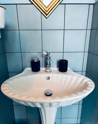 Salle de bains dans l'établissement Maison au cœur d'une ancienne ferme à BAYEUX