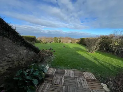 Jardin de l'établissement Grand Studio Vue Mer et Jardin
