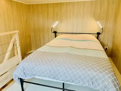 Un ou plusieurs lits dans un hébergement de l'établissement Tiny House à 10min du Mont Saint Michel
