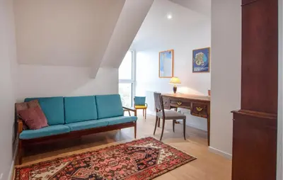 Coin salon dans l'établissement 2 Bedroom Cozy Home In Gouville-Sur-Mer