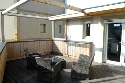 Coin salon dans l'établissement La Tourelle - Balcon vue mer et terrasse plein sud