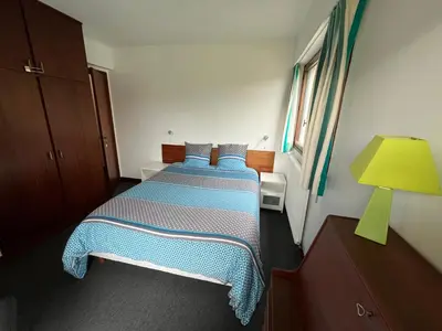 Un ou plusieurs lits dans un hébergement de l'établissement Villa d'architecte - Les Pieds dans l'Eau