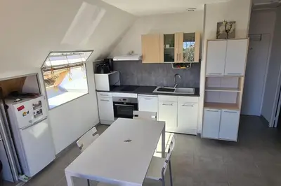 Cuisine ou kitchenette dans l'établissement Tipi des dunes