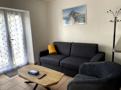 Coin salon dans l'établissement Gîte La Mouette de 4 personnes