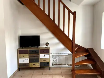 Télévision ou salle de divertissement dans l'établissement Gîte La Mouette de 4 personnes