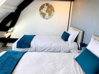 Un ou plusieurs lits dans un hébergement de l'établissement Gîte La Mouette de 4 personnes