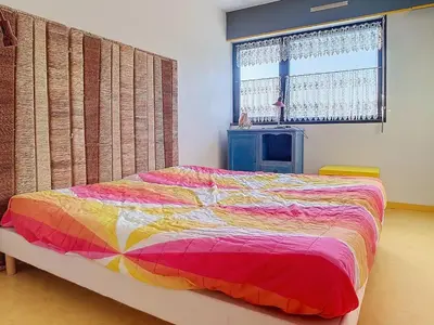 Un ou plusieurs lits dans un hébergement de l'établissement Duplex proche mer avec 8 couchages et parking - FR-1-746-17