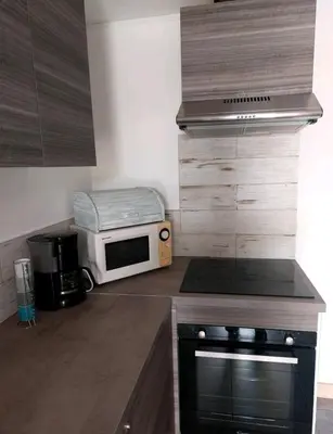 Cuisine ou kitchenette dans l'établissement Location Bord De Mer