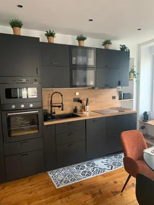 Cuisine ou kitchenette dans l'établissement Le RIVA Cherbourg Centre