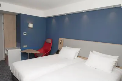Un ou plusieurs lits dans un hébergement de l'établissement Holiday Inn Express Caen Epron by IHG