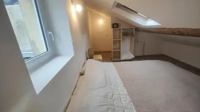 Un ou plusieurs lits dans un hébergement de l'établissement LaMaisonnette 500m plage Juno Beach