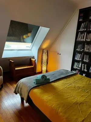 Un ou plusieurs lits dans un hébergement de l'établissement Chambres d'hôtes dans une magnifique propriété