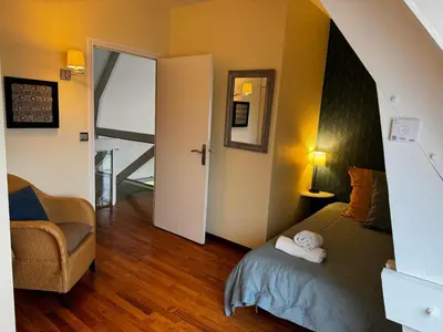 Un ou plusieurs lits dans un hébergement de l'établissement Chambres d'hôtes dans une magnifique propriété