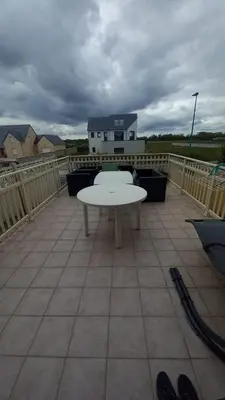 Balcon ou terrasse dans l'établissement Maison de plage avec accès direct à la plage
