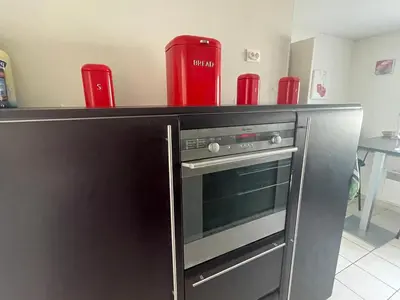 Cuisine ou kitchenette dans l'établissement Maison calme et cosy à Port-en-Bessin près du golf et de la mer
