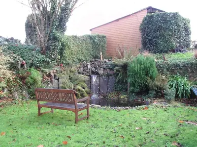 Jardin de l'établissement Le Clos des Tilleuls - D Day Home - Gîte