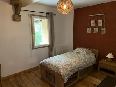 Un ou plusieurs lits dans un hébergement de l'établissement Le Clos des Tilleuls - D Day Home - Gîte