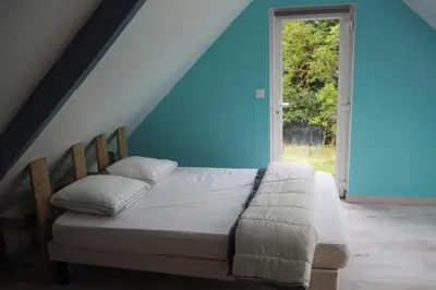 Un ou plusieurs lits dans un hébergement de l'établissement Le bois aux Ecureuils