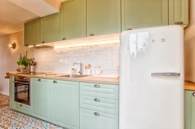 Cuisine ou kitchenette dans l'établissement Maison Victoria Cabourg