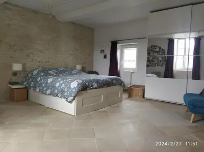 Un ou plusieurs lits dans un hébergement de l'établissement Grande et belle maison normande