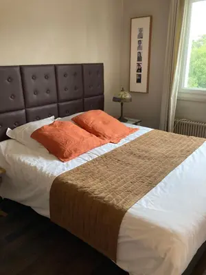Un ou plusieurs lits dans un hébergement de l'établissement Maison Blanche