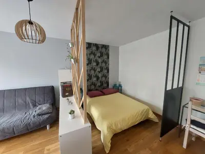 Un ou plusieurs lits dans un hébergement de l'établissement Appartement calme et cosy