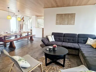 Coin salon dans l'établissement Le Cap Ouest