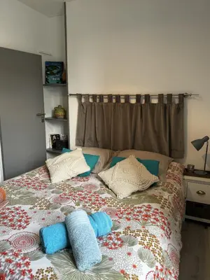 Un ou plusieurs lits dans un hébergement de l'établissement le Cozy Bayeusain